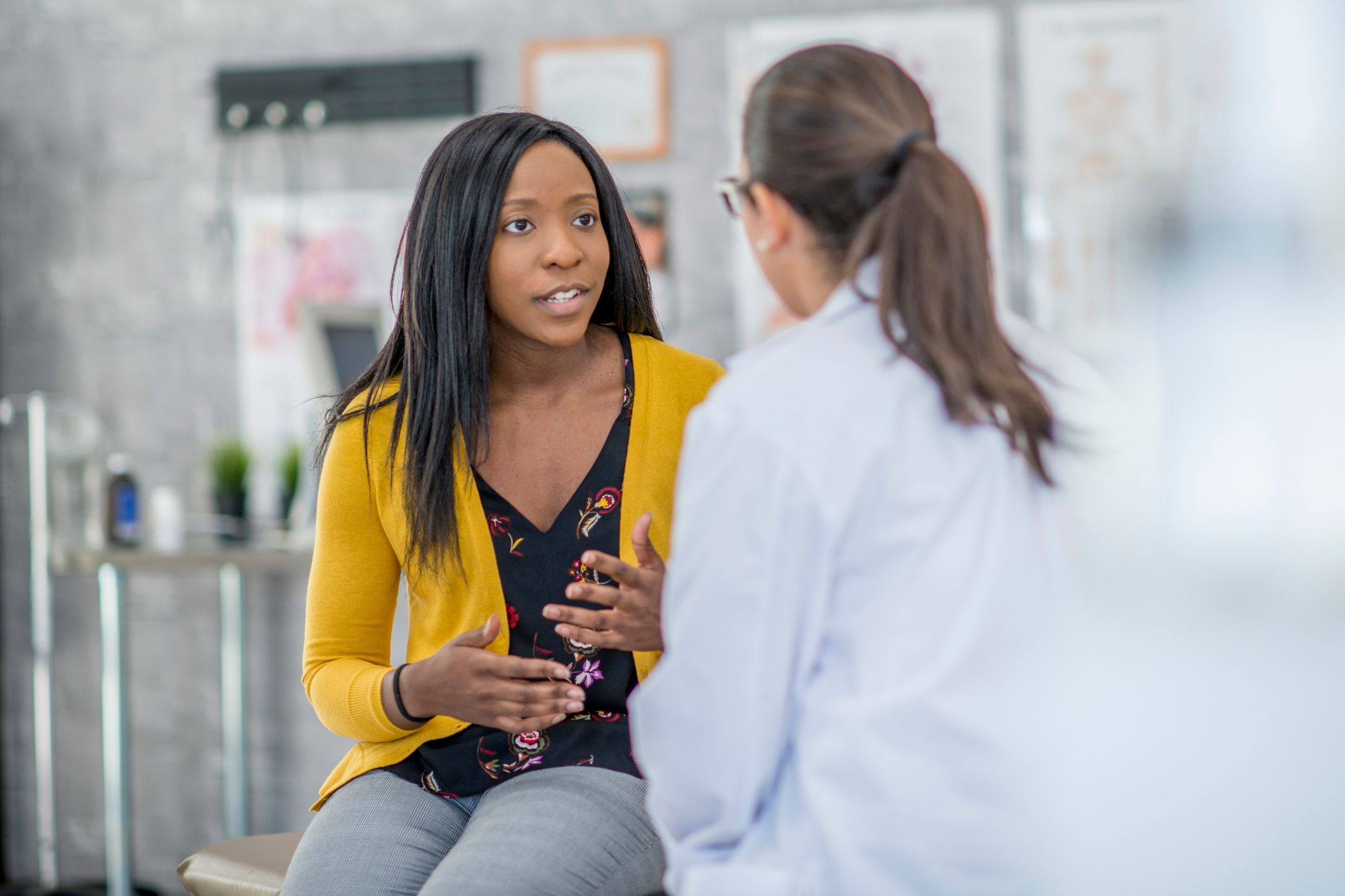 Patient Describing Symptoms to her doctor