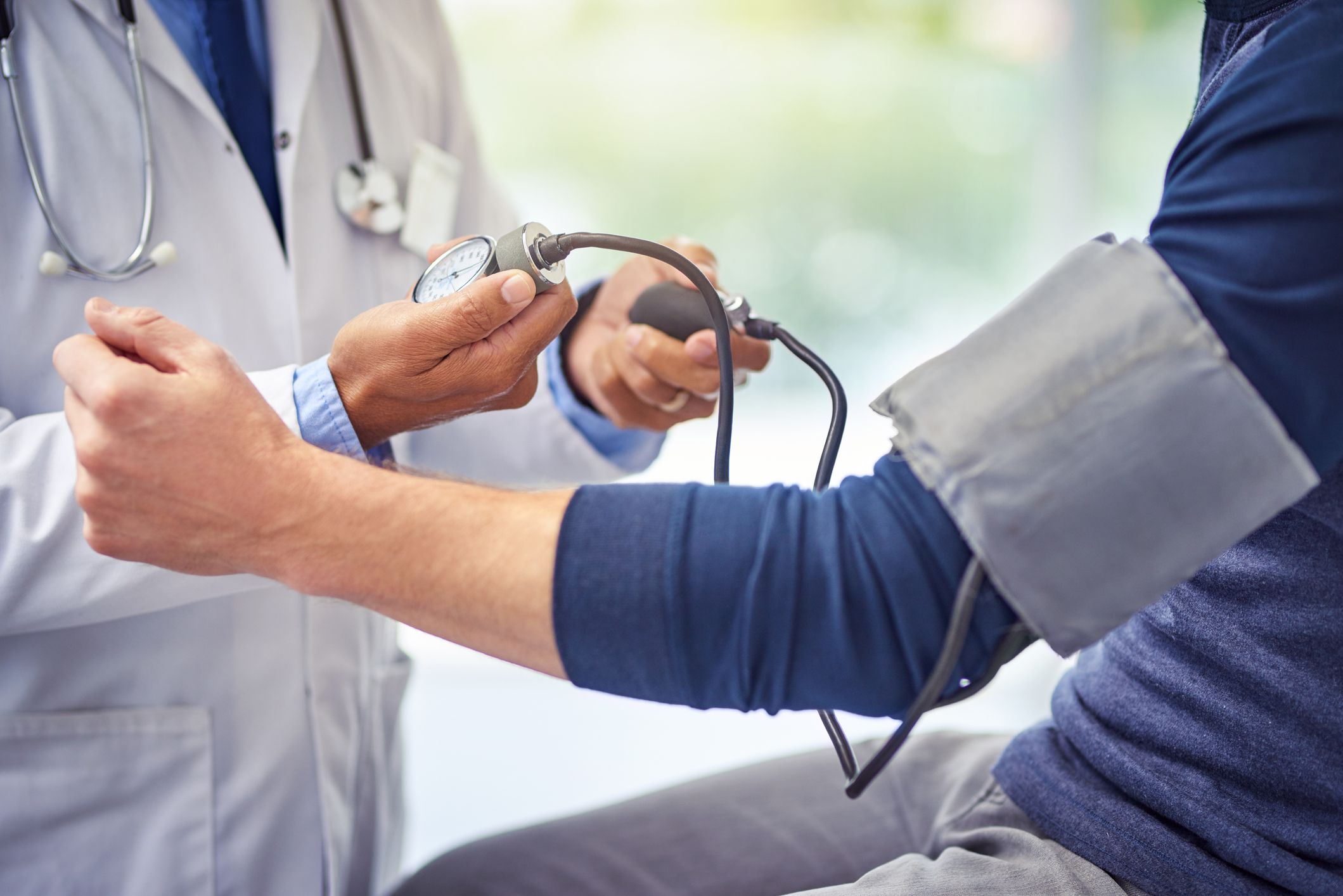 person getting their blood pressure taken