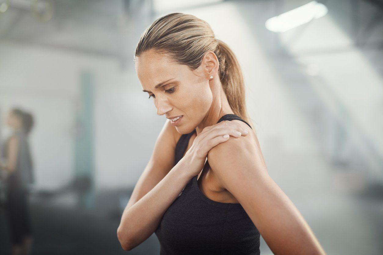 woman with sore muscles