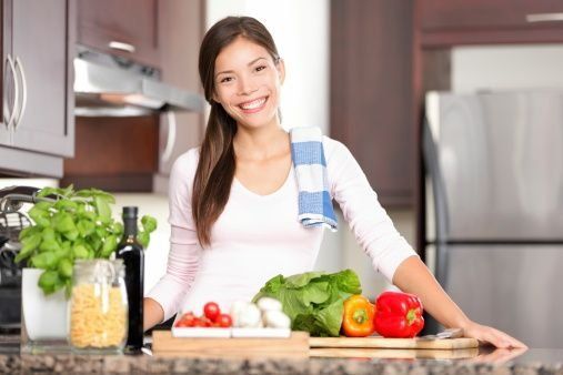 woman cooking in her kitchen