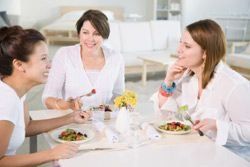 women sharing a meal