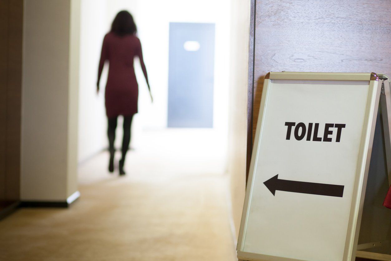 woman going to toilet