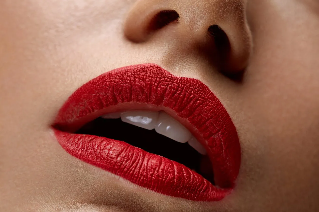 Woman Lips With Red Lipstick On