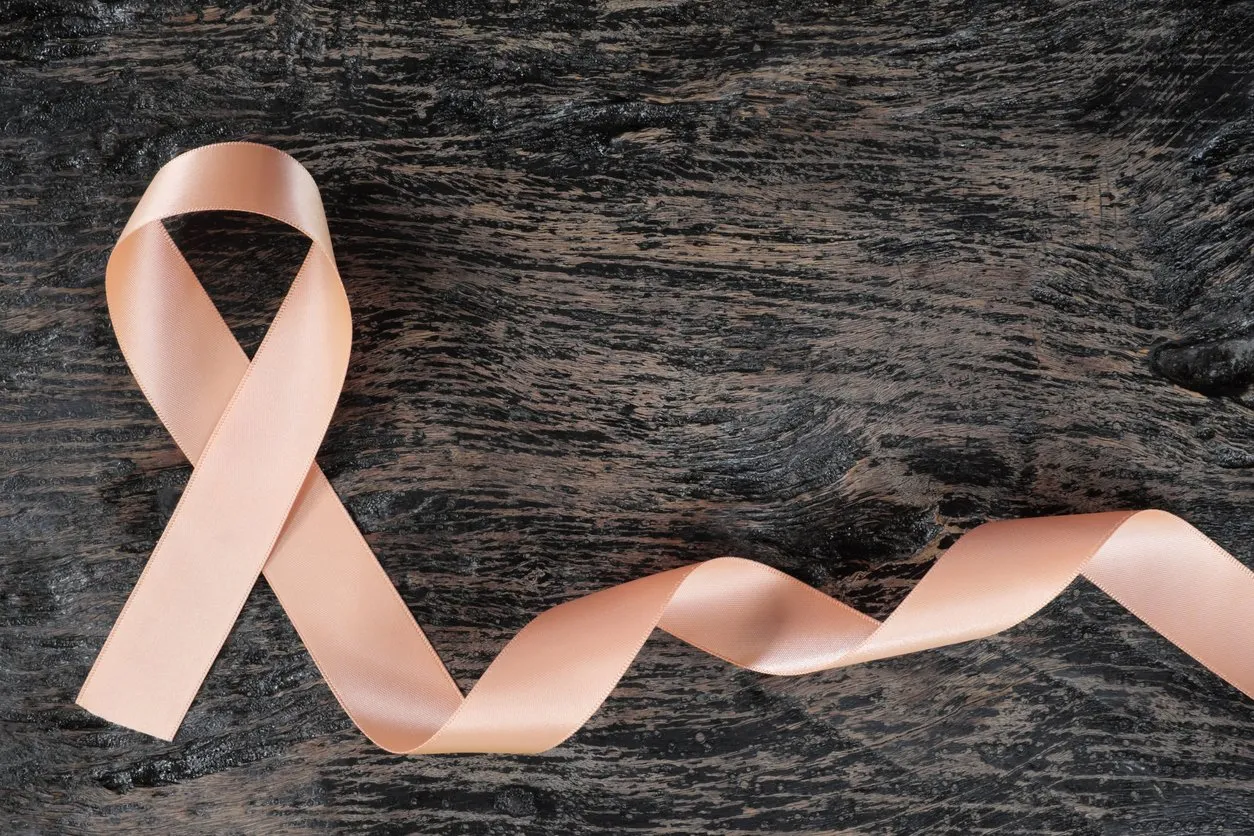 Uterine and endometrial cancer awareness peach ribbon