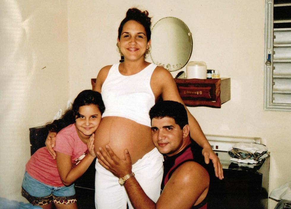 Osleidy and her daughter(s) and husband Damian in Cuba, 2008