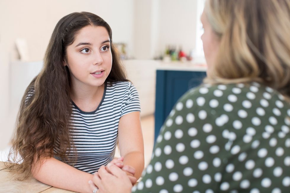 teenager girl talking to her mom